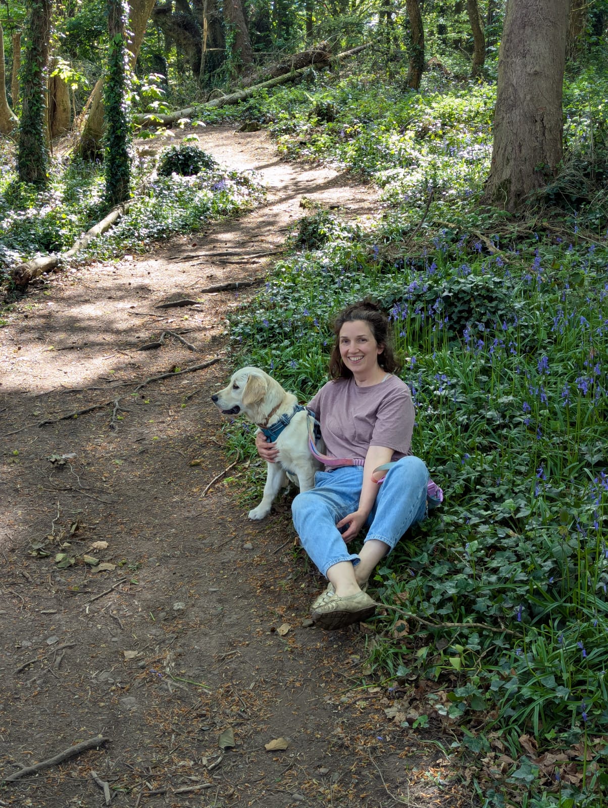 Impi and a dog enjoying a woodland walk